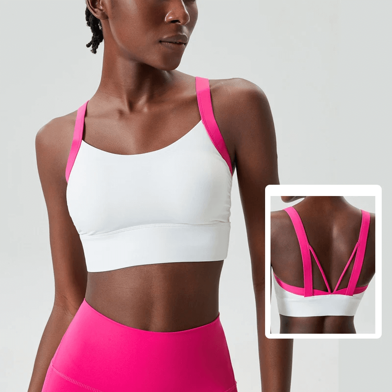 Women's Athletic Sports Bra Top SF2091 in pink and white with unique back design for yoga and fitness support.
